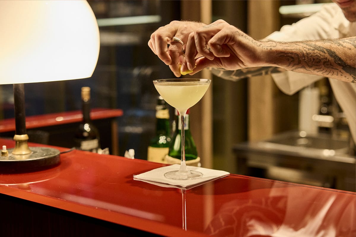Bartender preparing a cocktail at the bar